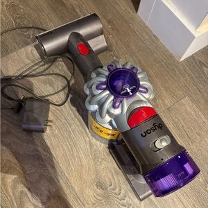 Dyson Cordless Vacuum - Purple and Gray. Compact. For boat and car.